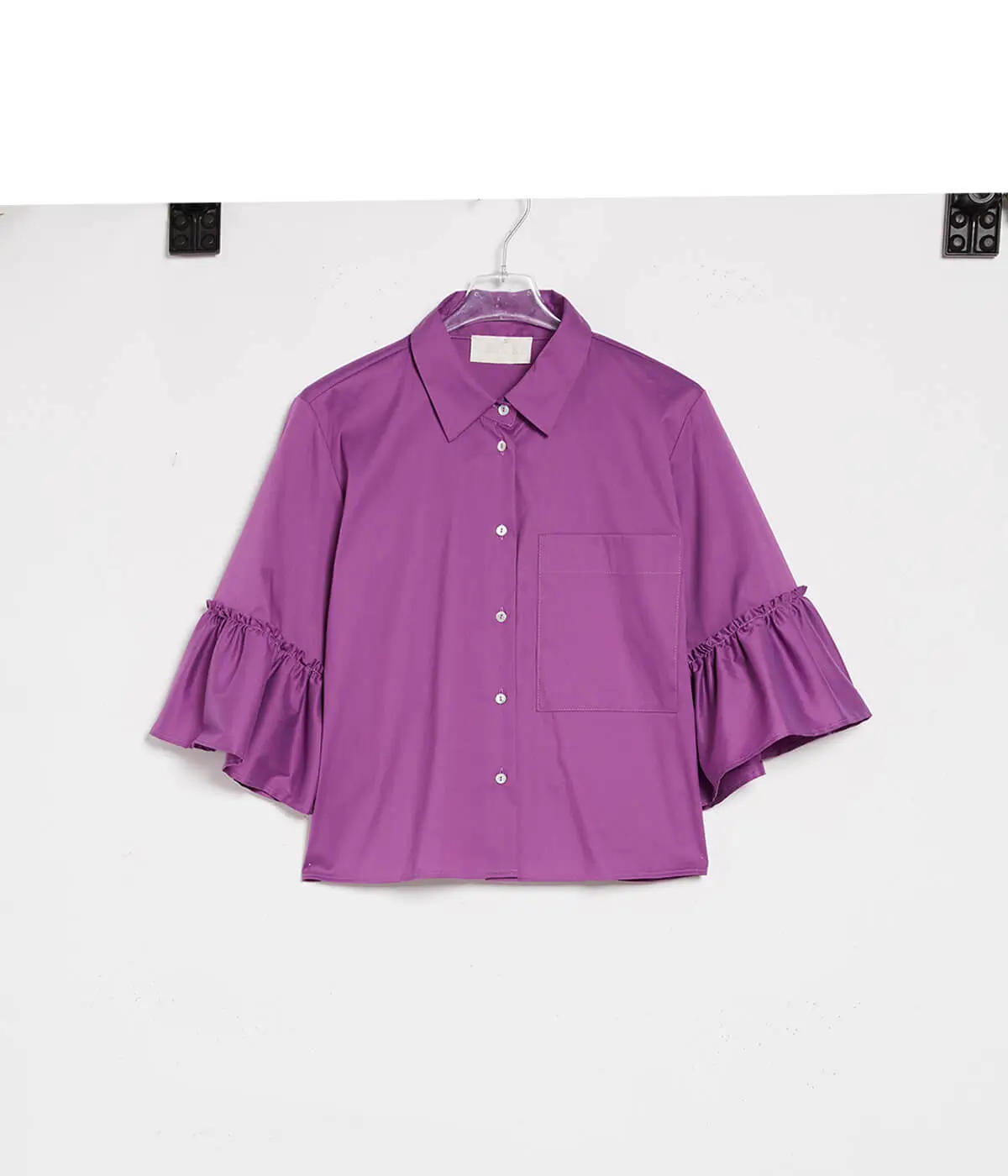 Top view flat lay photography of products arranged neatly on a clean background