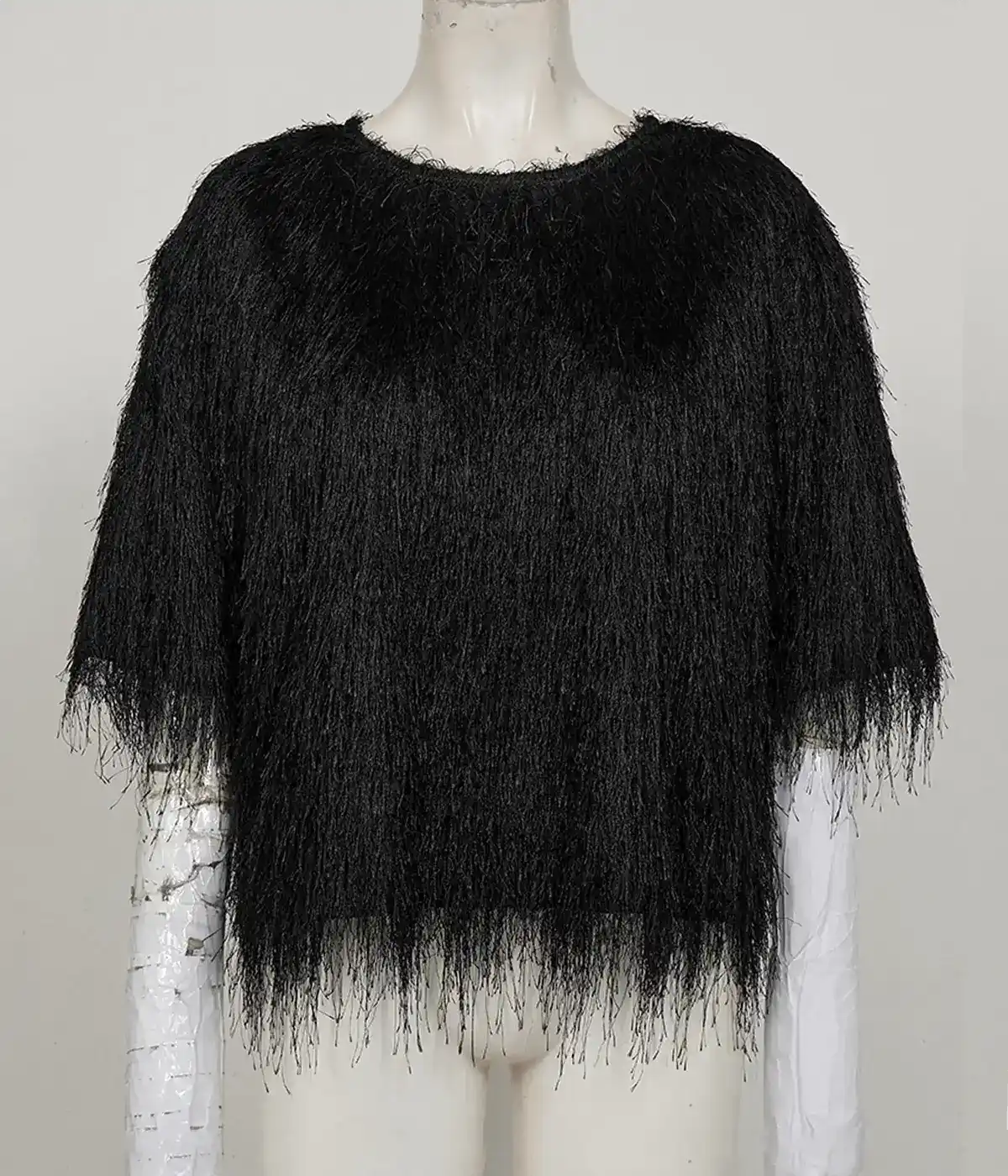 Professional ghost mannequin and neck joint service for a black textured top product photo