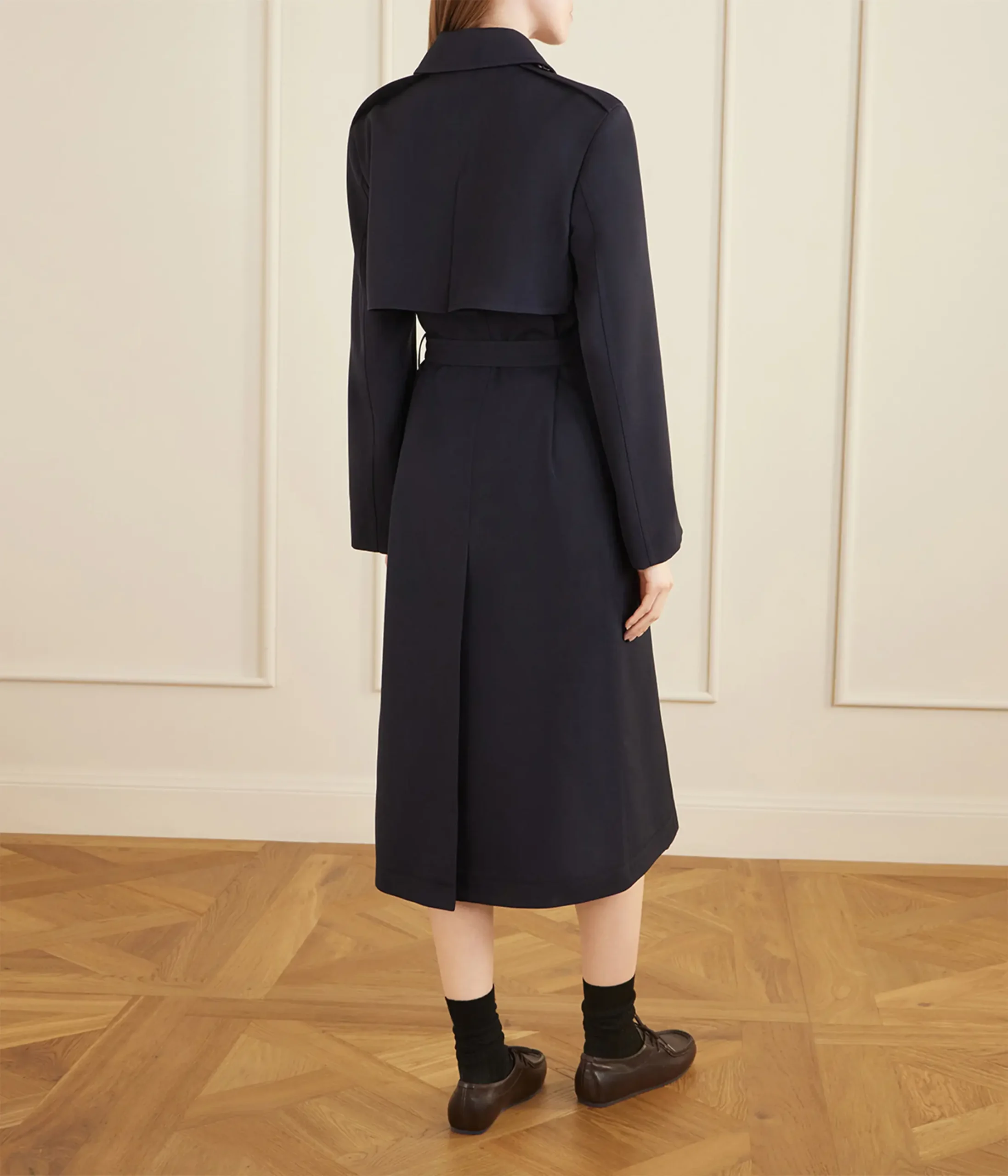 Fashion model clothing retouching service featuring a woman in a long navy blue dress