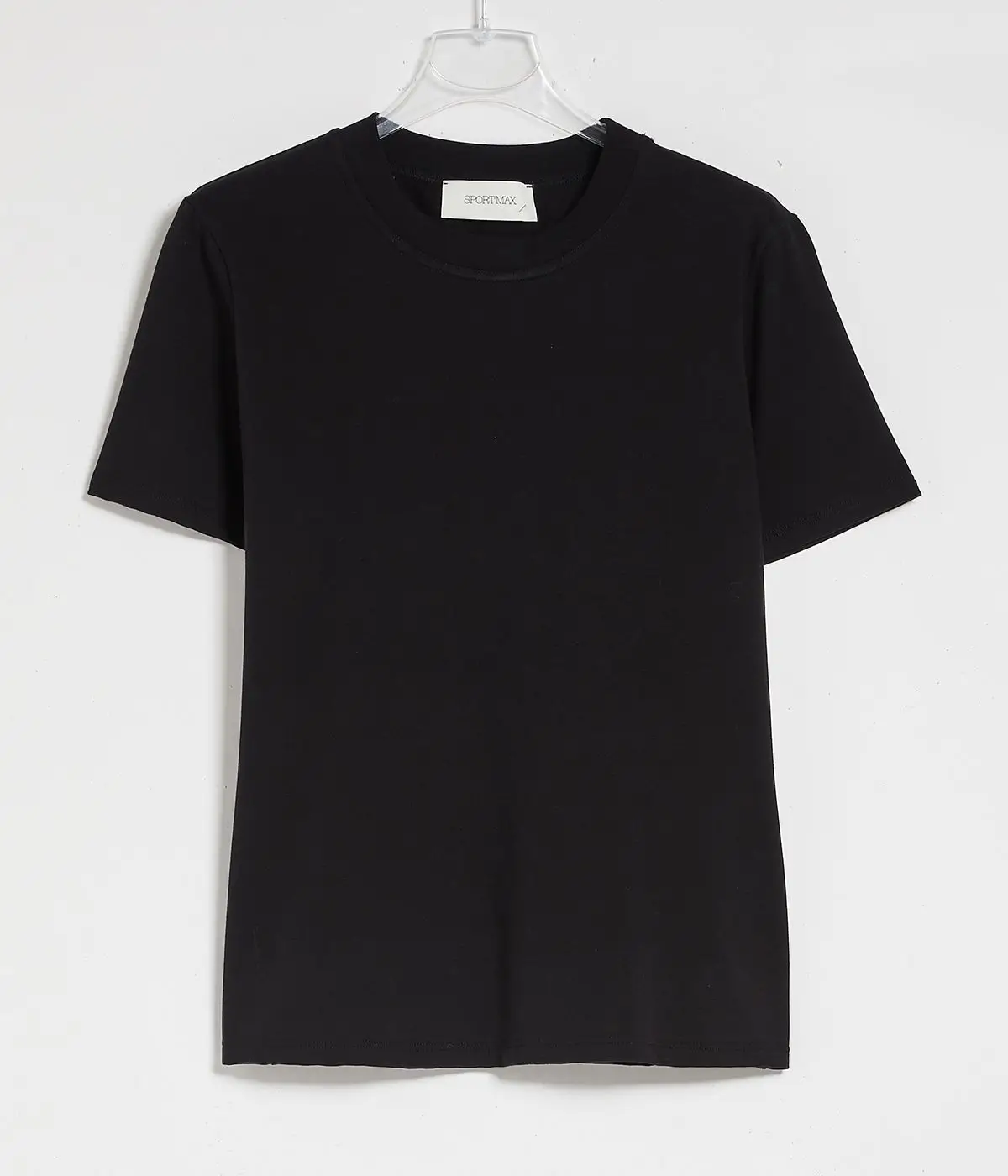 Professional flat lay clothing image editing for a black t-shirt product photo