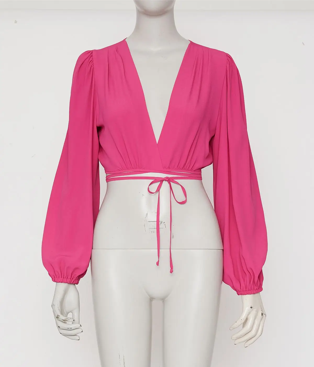 Professional ghost mannequin service for pink long sleeve crop top apparel