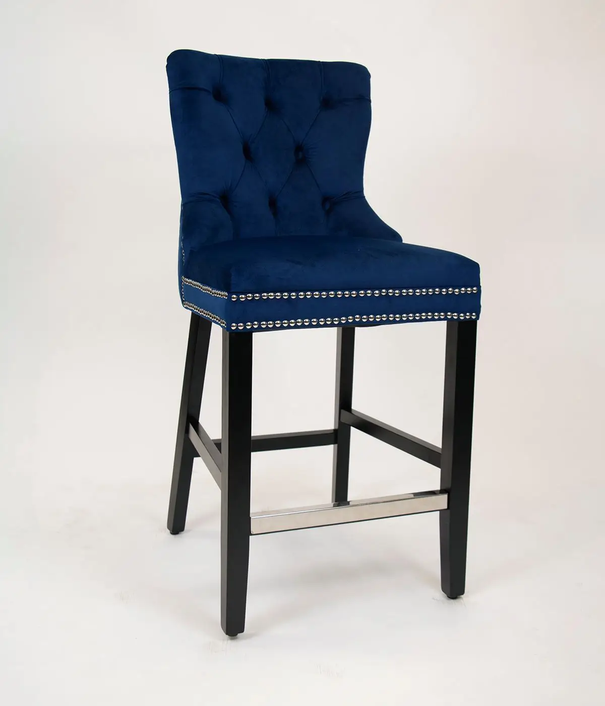 Professional product photo editing with natural shadow for a blue velvet bar stool.