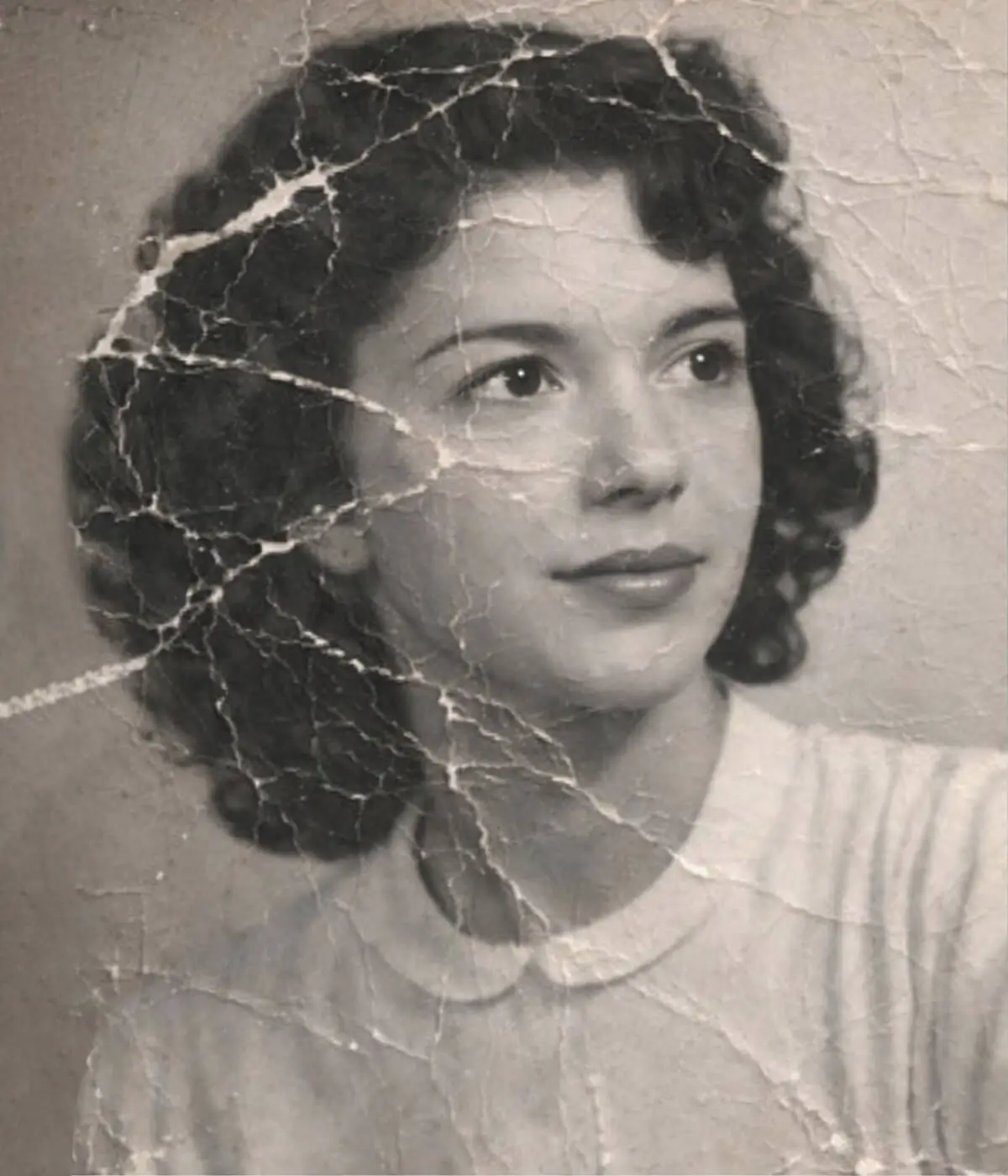 Professional photo restoration service for damaged vintage black and white portraits